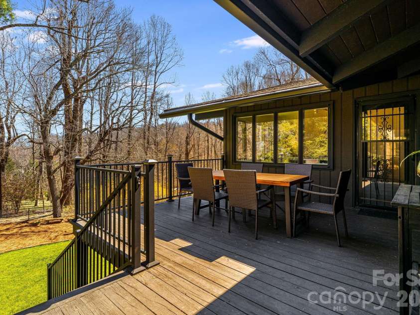 254 Orchard Circle, Laurel Park, NC 28739.  MLS# CAR4363320, YatesRealty ID 10980. Deck overlooking the backyard