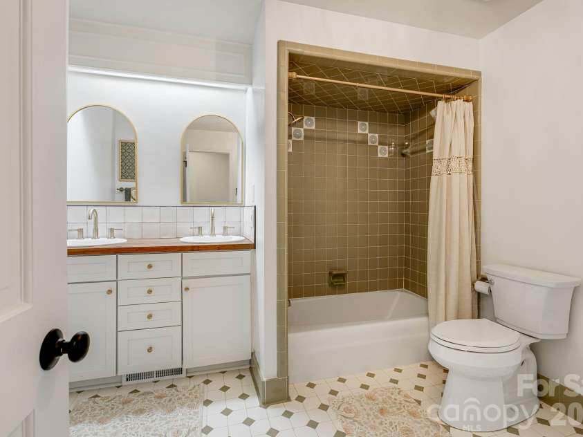 254 Orchard Circle, Laurel Park, NC 28739.  MLS# CAR4363320, YatesRealty ID 10980. Ensuite bathroom