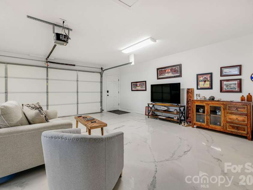 254 Orchard Circle, Laurel Park, NC 28739.  MLS# CAR4363320, YatesRealty ID 10980. Oversized attached two car garage