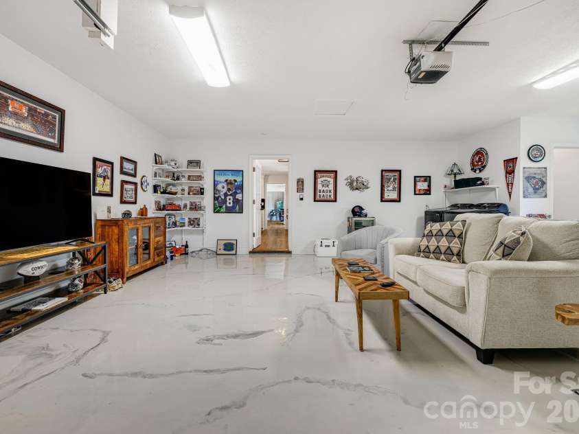 254 Orchard Circle, Laurel Park, NC 28739.  MLS# CAR4363320, YatesRealty ID 10980. Oversized garage with new marble epoxy floors