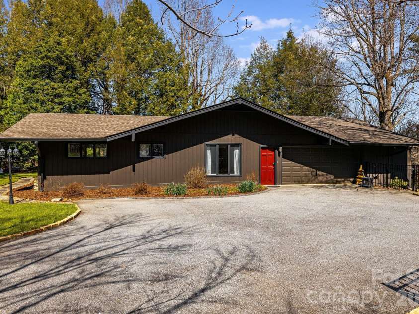 254 Orchard Circle, Laurel Park, NC 28739.  MLS# CAR4363320, YatesRealty ID 10980. Spacious flat driveway with room for multiple vehicles