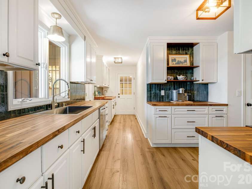 254 Orchard Circle, Laurel Park, NC 28739.  MLS# CAR4363320, YatesRealty ID 10980. Spacious kitchen