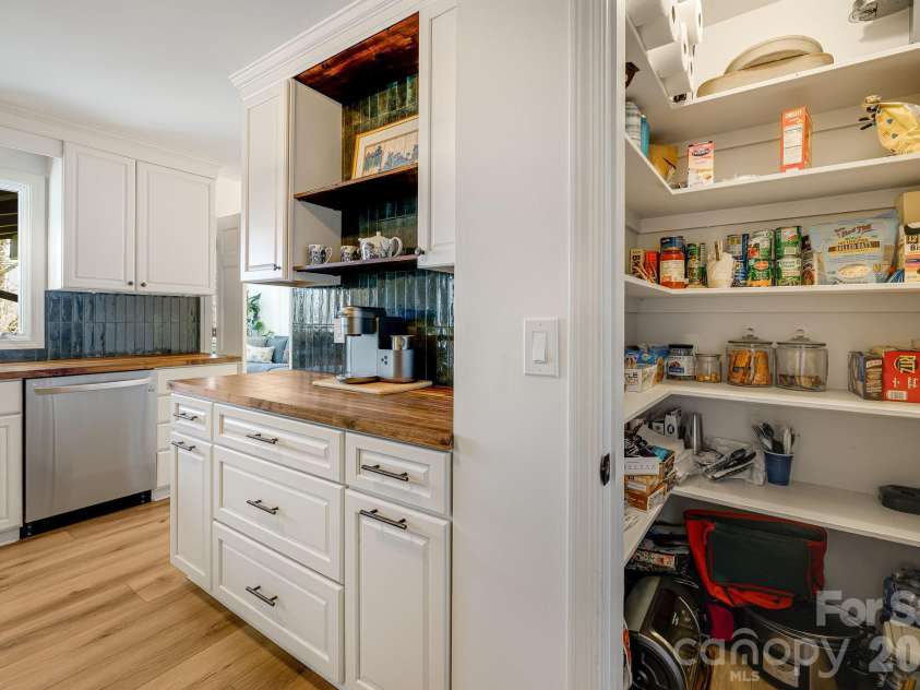 254 Orchard Circle, Laurel Park, NC 28739.  MLS# CAR4363320, YatesRealty ID 10980. Updated kitchen with pantry