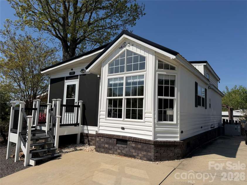 156 Marina Drive, New London, NC 28127.  MLS# CAR4365180, YatesRealty ID 10981. 