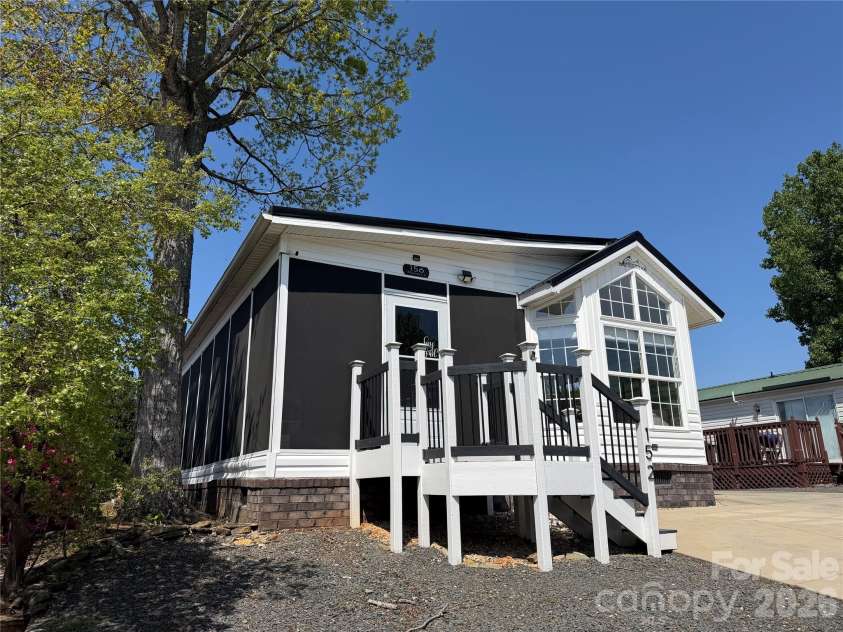 156 Marina Drive, New London, NC 28127.  MLS# CAR4365180, YatesRealty ID 10981. 