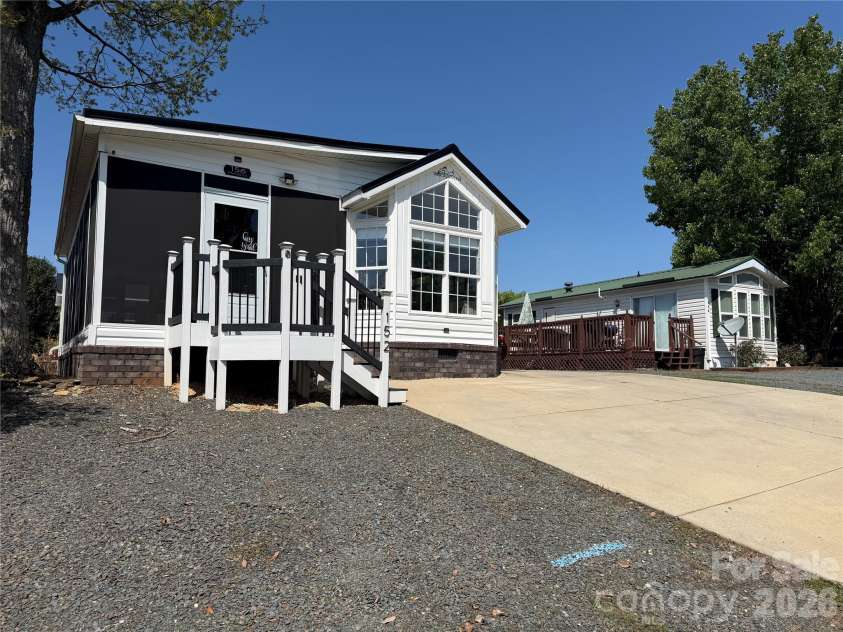 156 Marina Drive, New London, NC 28127.  MLS# CAR4365180, YatesRealty ID 10981. 