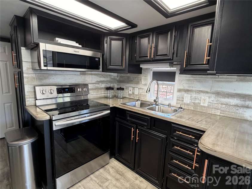 156 Marina Drive, New London, NC 28127.  MLS# CAR4365180, YatesRealty ID 10981. 