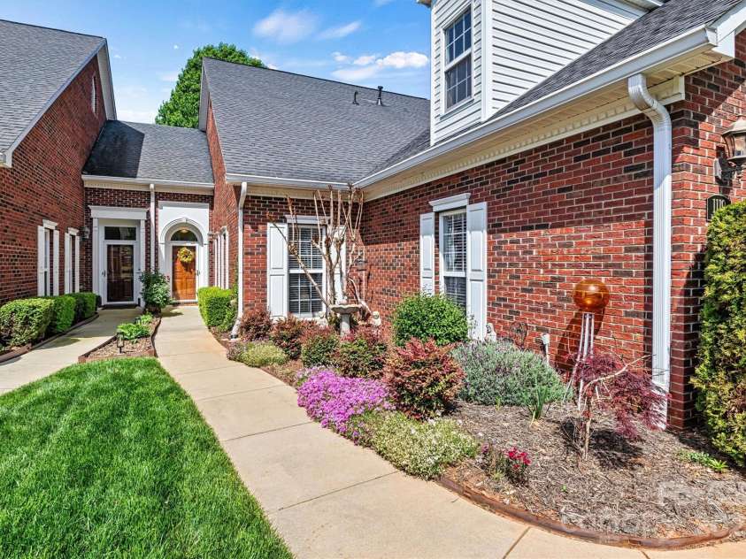 1119 21st Avenue, Hickory, NC 28601.  MLS# CAR4248559, YatesRealty ID 10982. Focused Front Walk -Spring mulch is on landscape schedule.