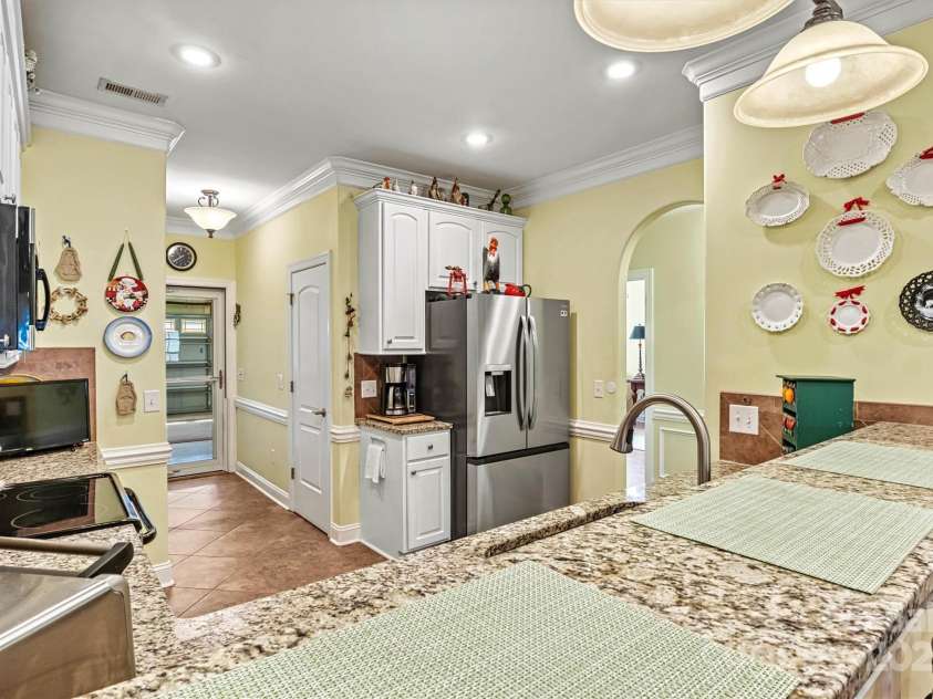 1119 21st Avenue, Hickory, NC 28601.  MLS# CAR4248559, YatesRealty ID 10982. Kitchen/Pantry/Garage Entry View