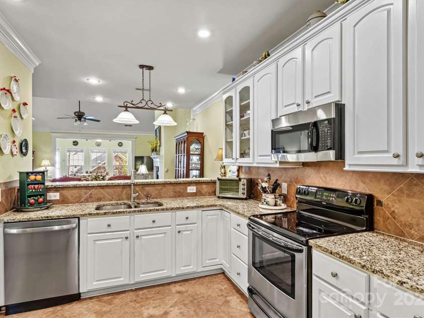 1119 21st Avenue, Hickory, NC 28601.  MLS# CAR4248559, YatesRealty ID 10982. Open Concept Kitchen/Dining/Living/Sunroom View