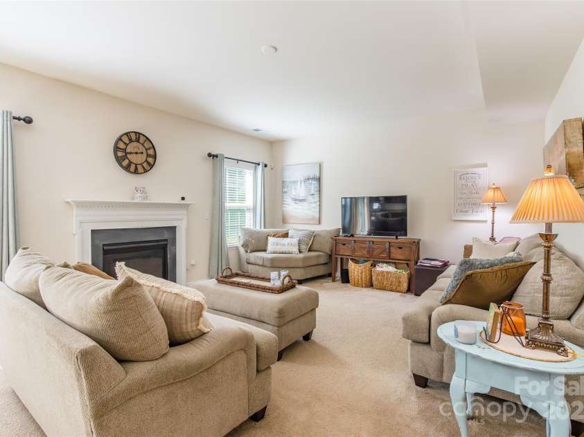 1737 Felts Parkway, Fort Mill, SC 29715.  MLS# CAR4300451, YatesRealty ID 10984. Large family room w/fireplace