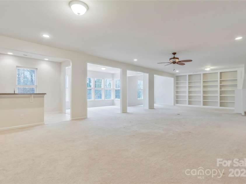 3015 Duclair Lane, Fort Mill, SC 29707.  MLS# CAR4237048, YatesRealty ID 10985. Electric stair chair virtually removed to show what it would look like.