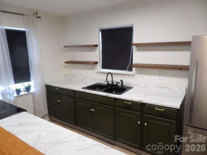 3216 Lasalle Street, Charlotte, NC 28216.  MLS# CAR4325298, YatesRealty ID 10988. 