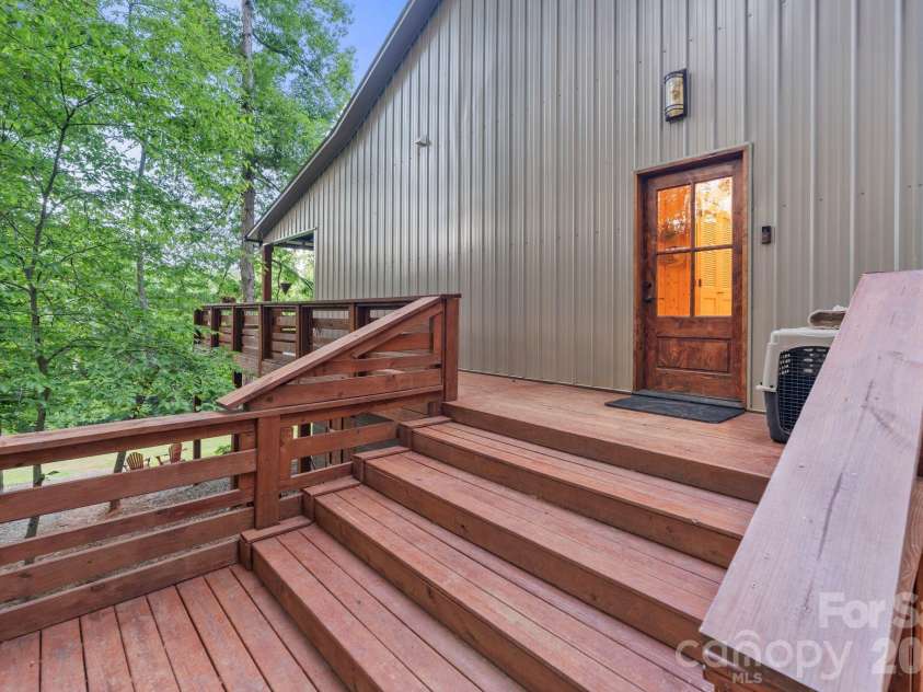 9870 Harvest Lane, Davidson, NC 28036.  MLS# CAR4385994, YatesRealty ID 10989. Barndominium deck