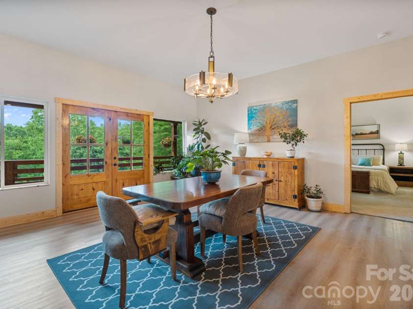 9870 Harvest Lane, Davidson, NC 28036.  MLS# CAR4385994, YatesRealty ID 10989. Barndominium dining area