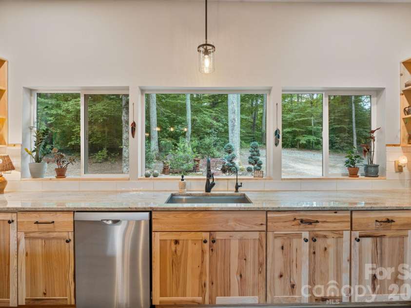 9870 Harvest Lane, Davidson, NC 28036.  MLS# CAR4385994, YatesRealty ID 10989. Barndominium kitchen