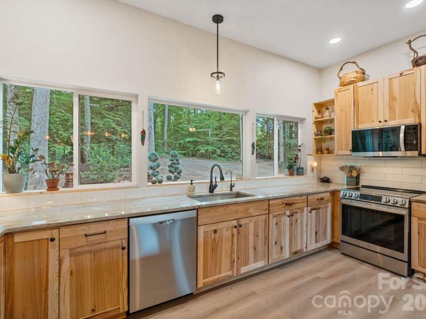 9870 Harvest Lane, Davidson, NC 28036.  MLS# CAR4385994, YatesRealty ID 10989. Barndominium kitchen
