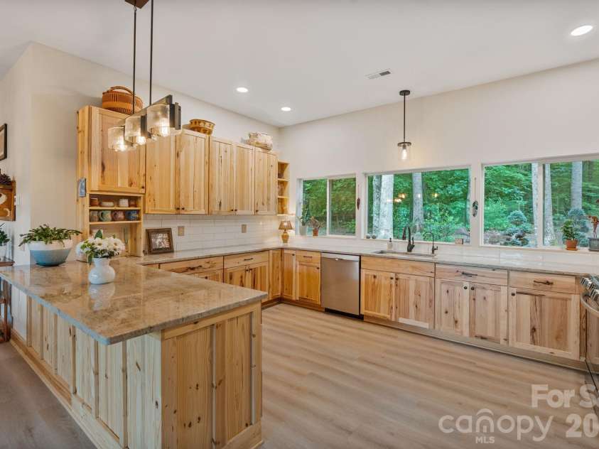 9870 Harvest Lane, Davidson, NC 28036.  MLS# CAR4385994, YatesRealty ID 10989. Barndominium kitchen