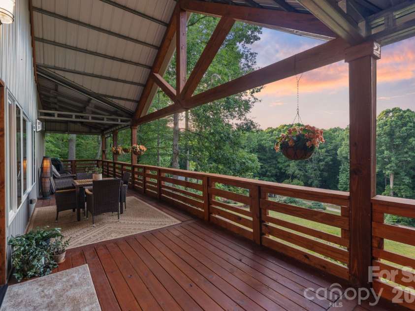 9870 Harvest Lane, Davidson, NC 28036.  MLS# CAR4385994, YatesRealty ID 10989. Barndominium porch