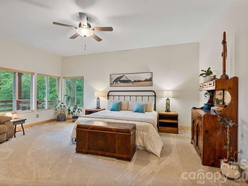 9870 Harvest Lane, Davidson, NC 28036.  MLS# CAR4385994, YatesRealty ID 10989. Barndominium primary bedroom