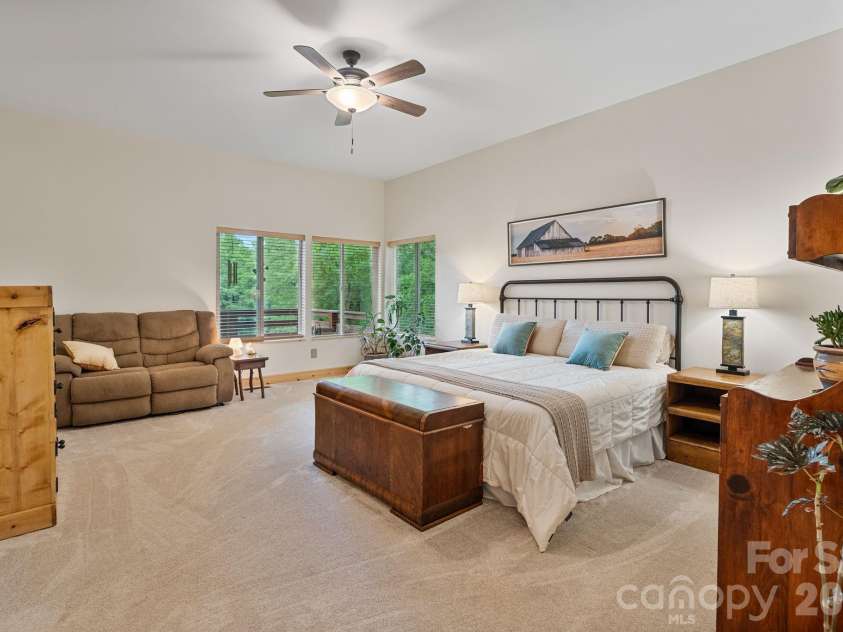 9870 Harvest Lane, Davidson, NC 28036.  MLS# CAR4385994, YatesRealty ID 10989. Barndominium primary bedroom