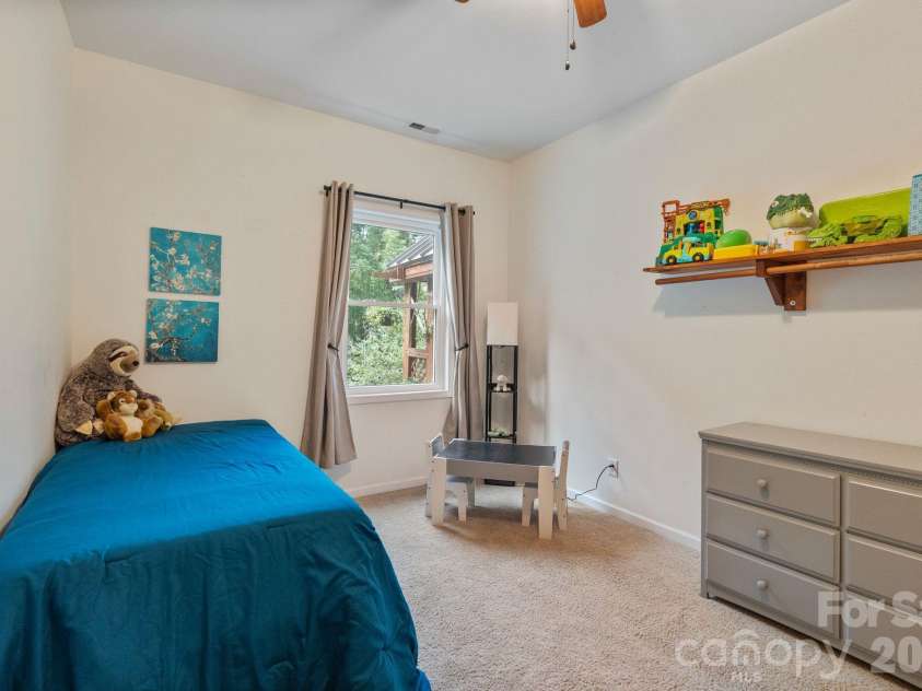 9870 Harvest Lane, Davidson, NC 28036.  MLS# CAR4385994, YatesRealty ID 10989. Cottage bedroom 