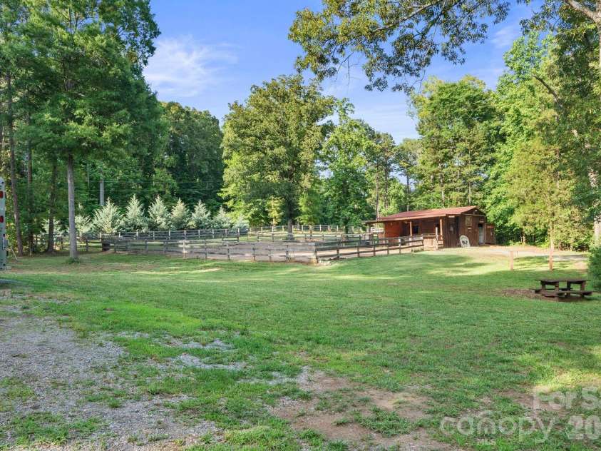 9870 Harvest Lane, Davidson, NC 28036.  MLS# CAR4385994, YatesRealty ID 10989. Horsebarn