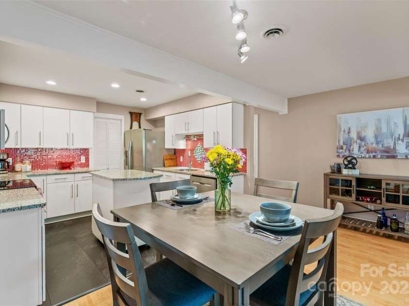 5 Lakemoor Lane, Hendersonville, NC 28739.  MLS# CAR4253352, YatesRealty ID 10990. Dining/Kitchen/Living