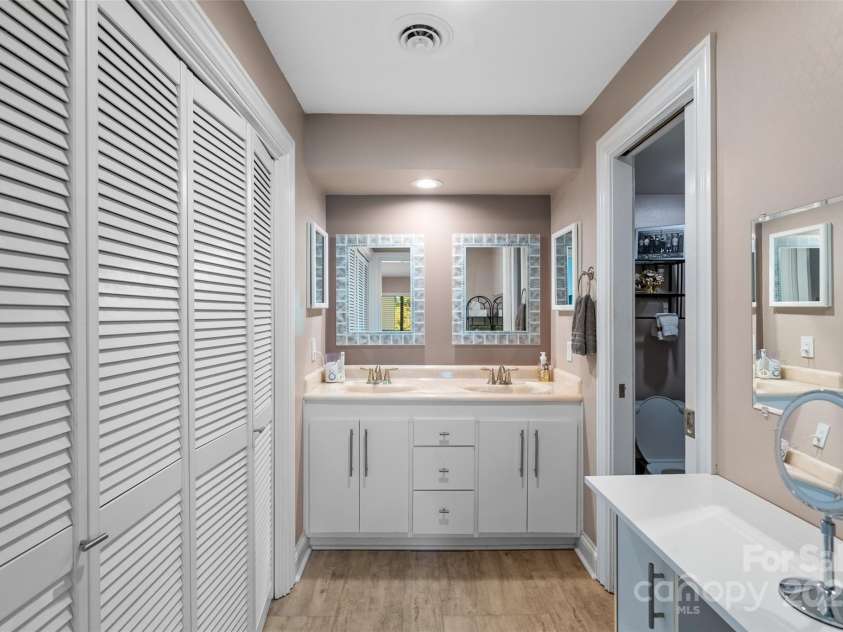5 Lakemoor Lane, Hendersonville, NC 28739.  MLS# CAR4253352, YatesRealty ID 10990. Primary Vanity Area