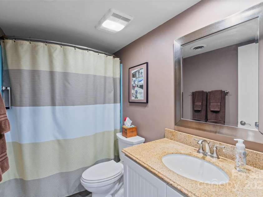 5 Lakemoor Lane, Hendersonville, NC 28739.  MLS# CAR4253352, YatesRealty ID 10990. Second bath