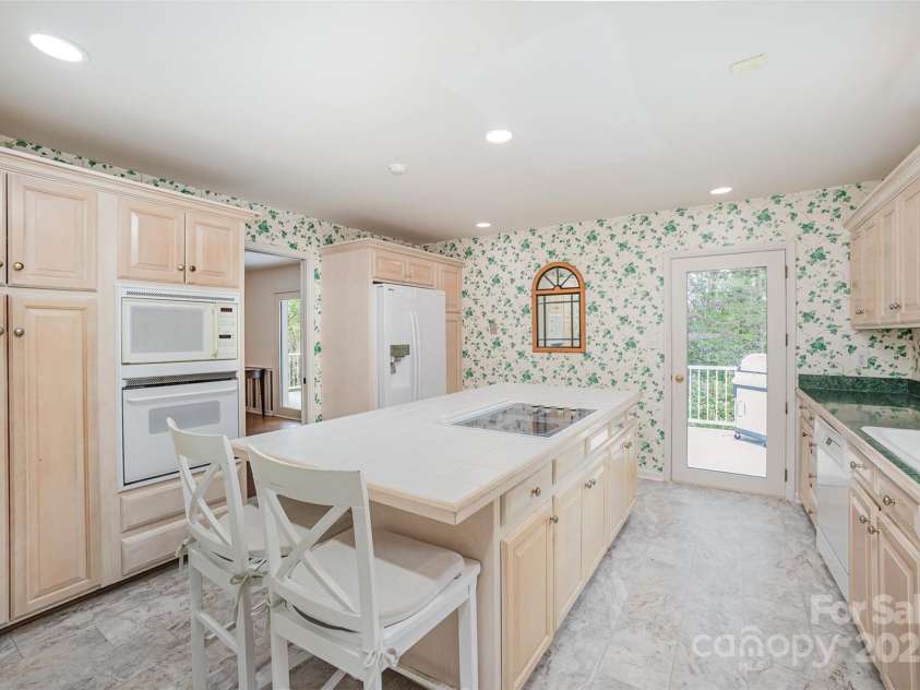726 Grandview Drive, Concord, NC 28025.  MLS# CAR4242863, YatesRealty ID 10992. Kitchen fixtures abundant cabinets and large island