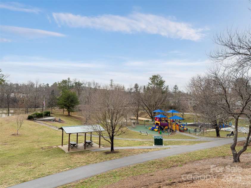 7 Barnett Shoals Drive, Weaverville, NC 28787.  MLS# CAR4242120, YatesRealty ID 10995. Lake Louise park with playground, picnic and walking trails.