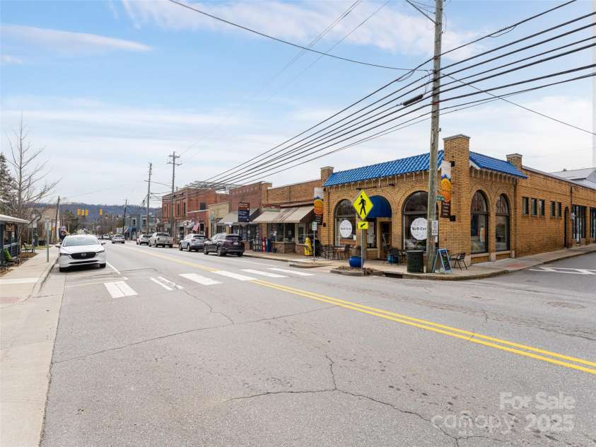 7 Barnett Shoals Drive, Weaverville, NC 28787.  MLS# CAR4242120, YatesRealty ID 10995. Quaint downtown Weaverville. Well-Bred Bakery a favorite breakfast or lunch spot!