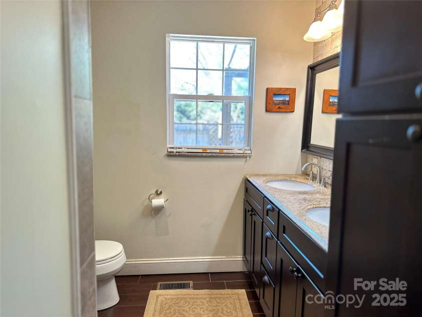 207 Lakeside Avenue, Davidson, NC 28036.  MLS# CAR4239129, YatesRealty ID 10998. 