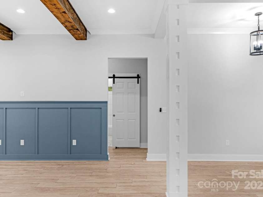 142 Crystal Heights Drive, Hendersonville, NC 28739.  MLS# CAR4310051, YatesRealty ID 110. Hallway to secondary bedrooms and full bath.