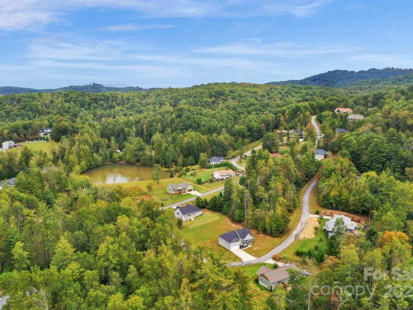 142 Crystal Heights Drive, Hendersonville, NC 28739.  MLS# CAR4310051, YatesRealty ID 110. Nestled in a quiet Community