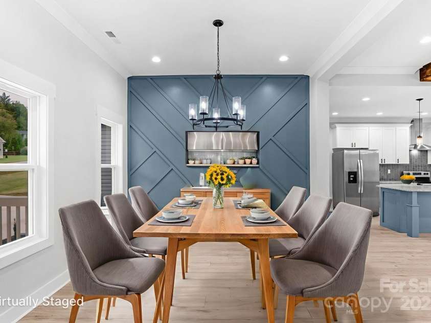 142 Crystal Heights Drive, Hendersonville, NC 28739.  MLS# CAR4310051, YatesRealty ID 110. Virtually Staged Dining