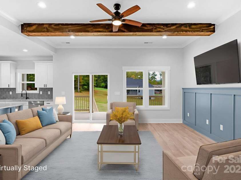 142 Crystal Heights Drive, Hendersonville, NC 28739.  MLS# CAR4310051, YatesRealty ID 110. Virtually Staged Family Room