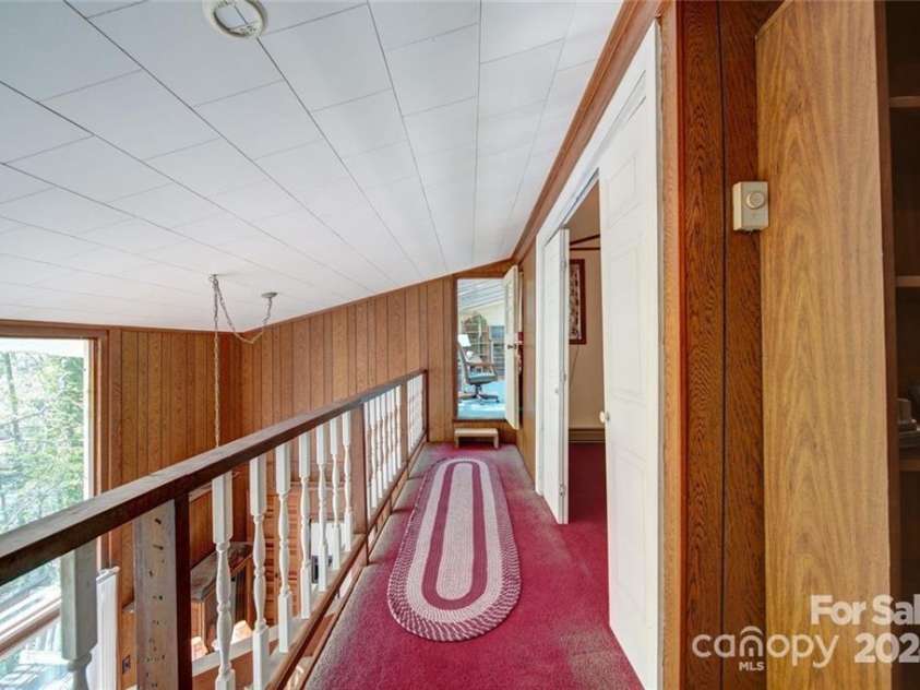 177 Mountain View Lane, Troy, NC 27371.  MLS# CAR4269979, YatesRealty ID 110. Ceiling does not look like this. Wind blew in thru the missing soffit and blew all of the ceiling tiles down.