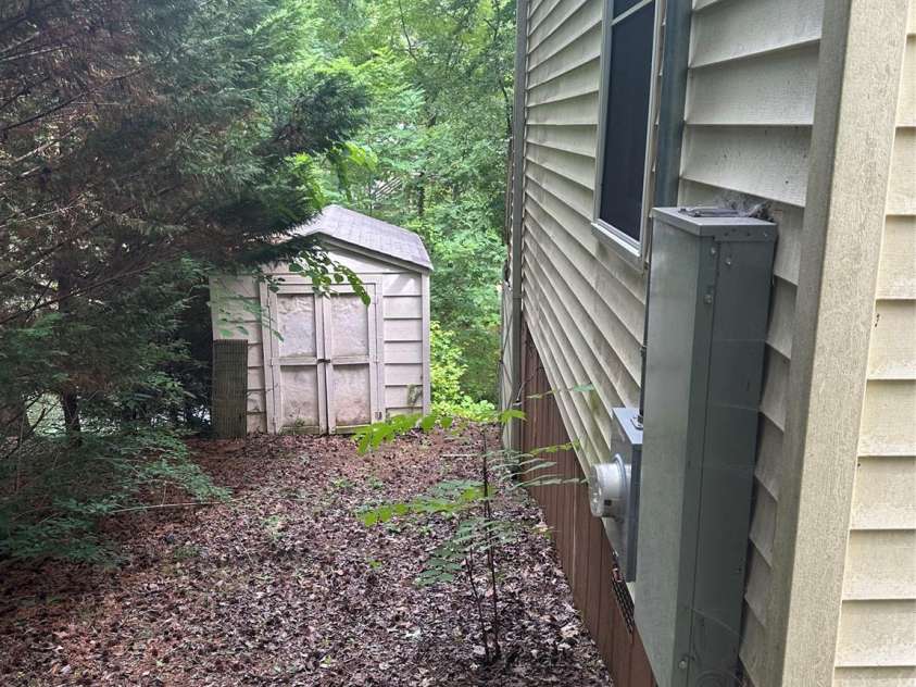 177 Mountain View Lane, Troy, NC 27371.  MLS# CAR4269979, YatesRealty ID 110. New electrical panel and the storage building