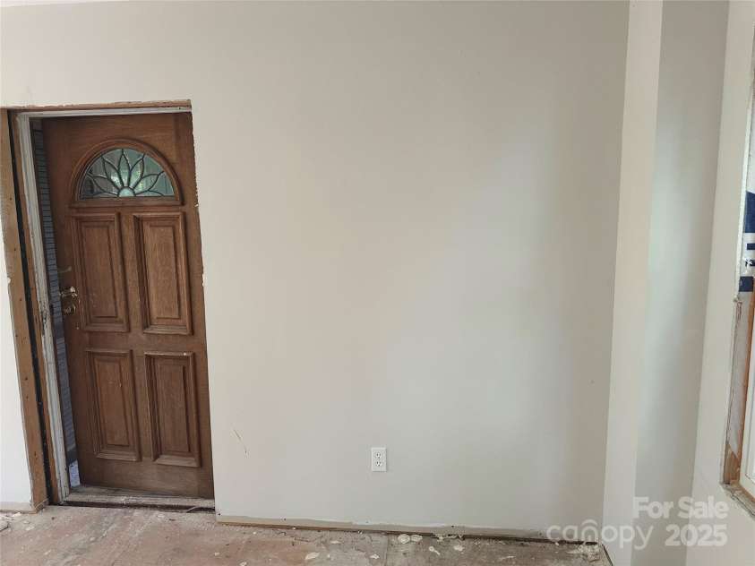177 Mountain View Lane, Troy, NC 27371.  MLS# CAR4269979, YatesRealty ID 110. This wall was built with an LVL which will allow you to remove the drywall for an open concept.