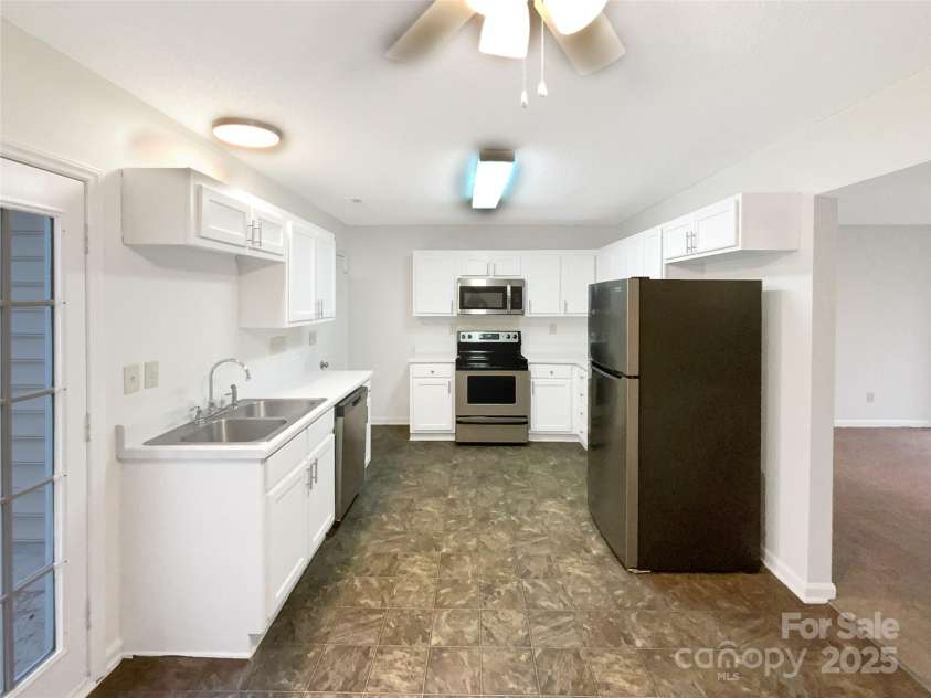 1313 Ridgewood Drive, Concord, NC 28027.  MLS# CAR4235349, YatesRealty ID 11008. 