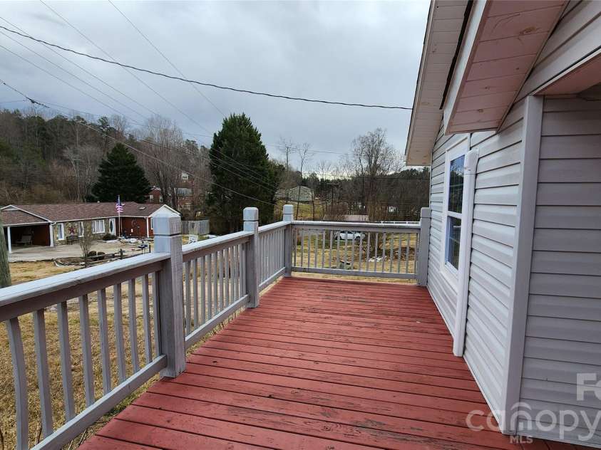 431 Ashworth Circle, Marion, NC 28752.  MLS# CAR4368677, YatesRealty ID 11008. Front deck overlooks neighborhood