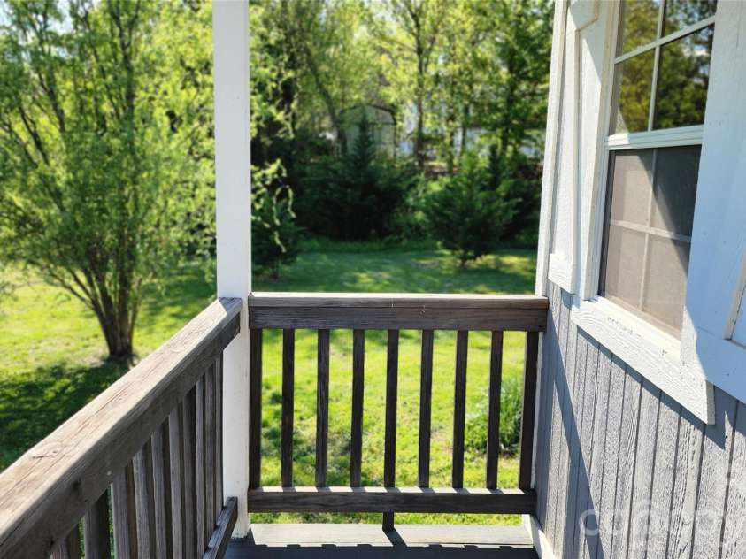 431 Ashworth Circle, Marion, NC 28752.  MLS# CAR4368677, YatesRealty ID 11008. Small porch on detached outbuilding