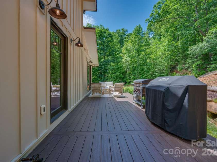 54 Holland Drive, Columbus, NC 28722.  MLS# CAR4309470, YatesRealty ID 11010. Composite back deck