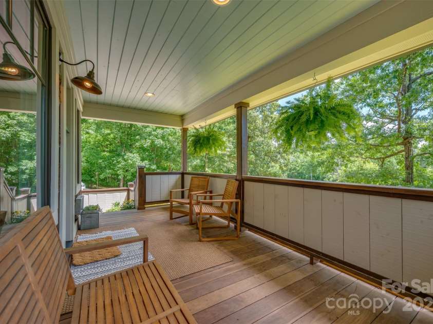 54 Holland Drive, Columbus, NC 28722.  MLS# CAR4309470, YatesRealty ID 11010. Front porch