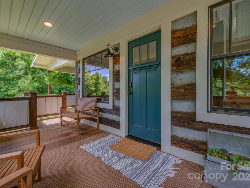 54 Holland Drive, Columbus, NC 28722.  MLS# CAR4309470, YatesRealty ID 11010. Front porch