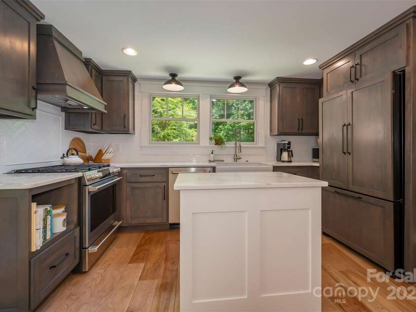 54 Holland Drive, Columbus, NC 28722.  MLS# CAR4309470, YatesRealty ID 11010. Panel front KitchenAid refrigerator