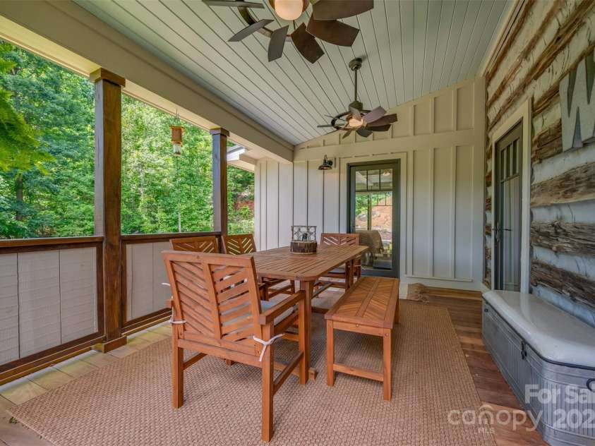 54 Holland Drive, Columbus, NC 28722.  MLS# CAR4309470, YatesRealty ID 11010. Side porch