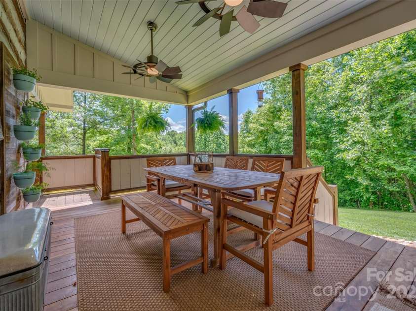 54 Holland Drive, Columbus, NC 28722.  MLS# CAR4309470, YatesRealty ID 11010. Side porch with Ipe decking